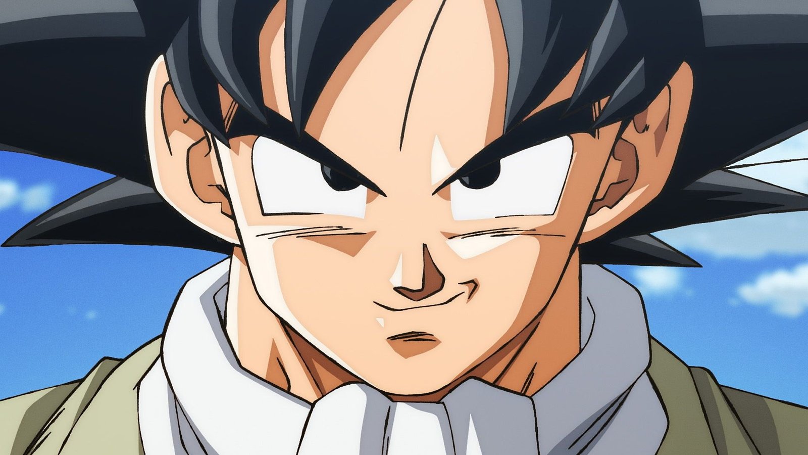 Dragon Ball Super Beerus ilk bölüm resmi karesinden mavi gökyüzü önünde gülümseyen Goku