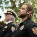Fire Country 5. sezon CBS resmi karesinden Max Thieriot itfaiye töreninde